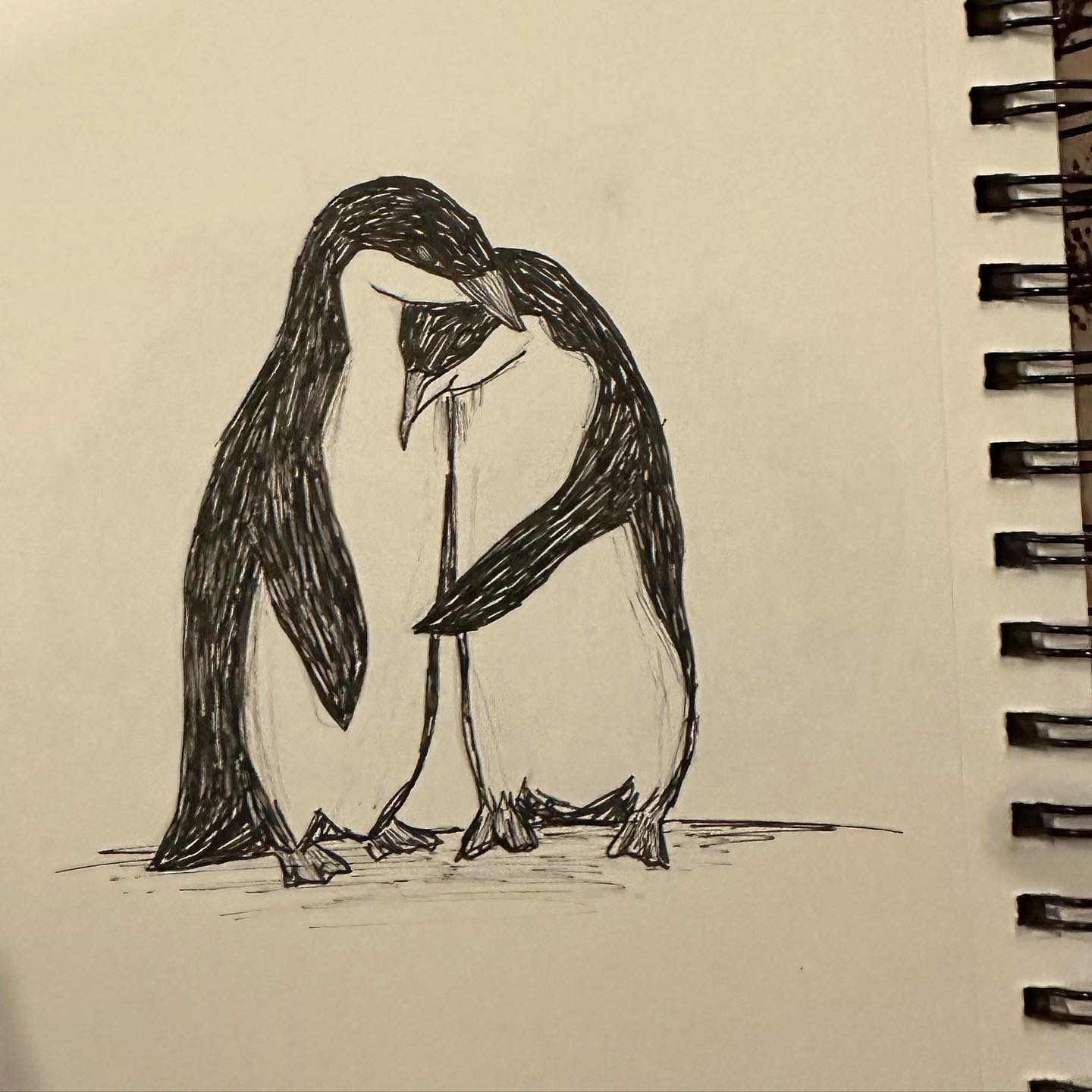 A quick sketch of penguins cuddling