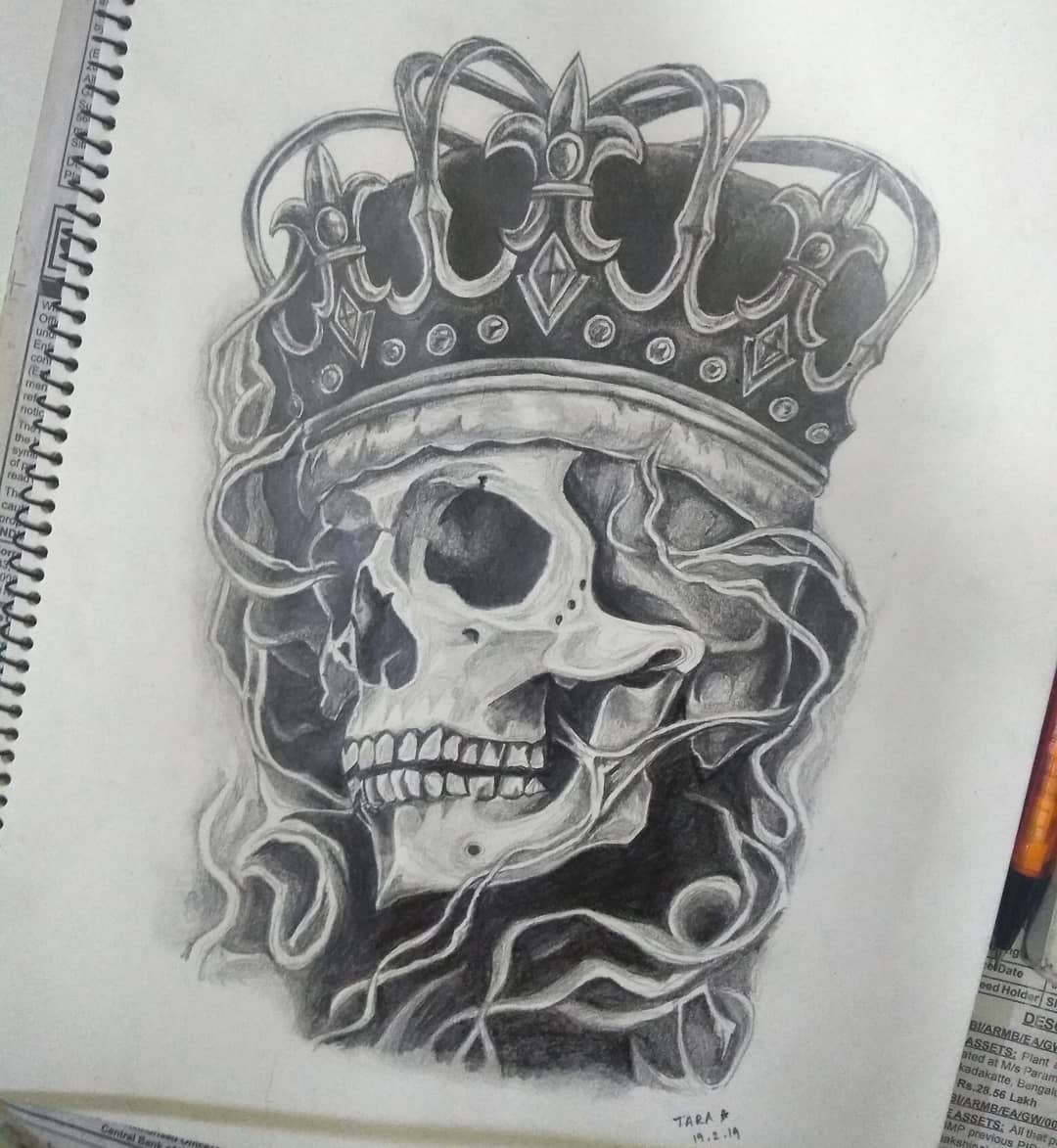 A drawing of a skull with a crown